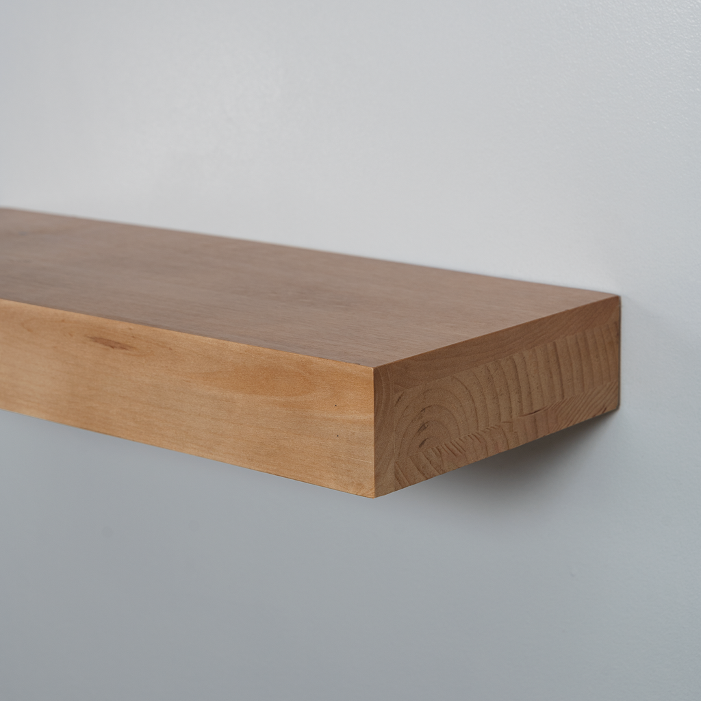 Wooden floating shelf against a plain background