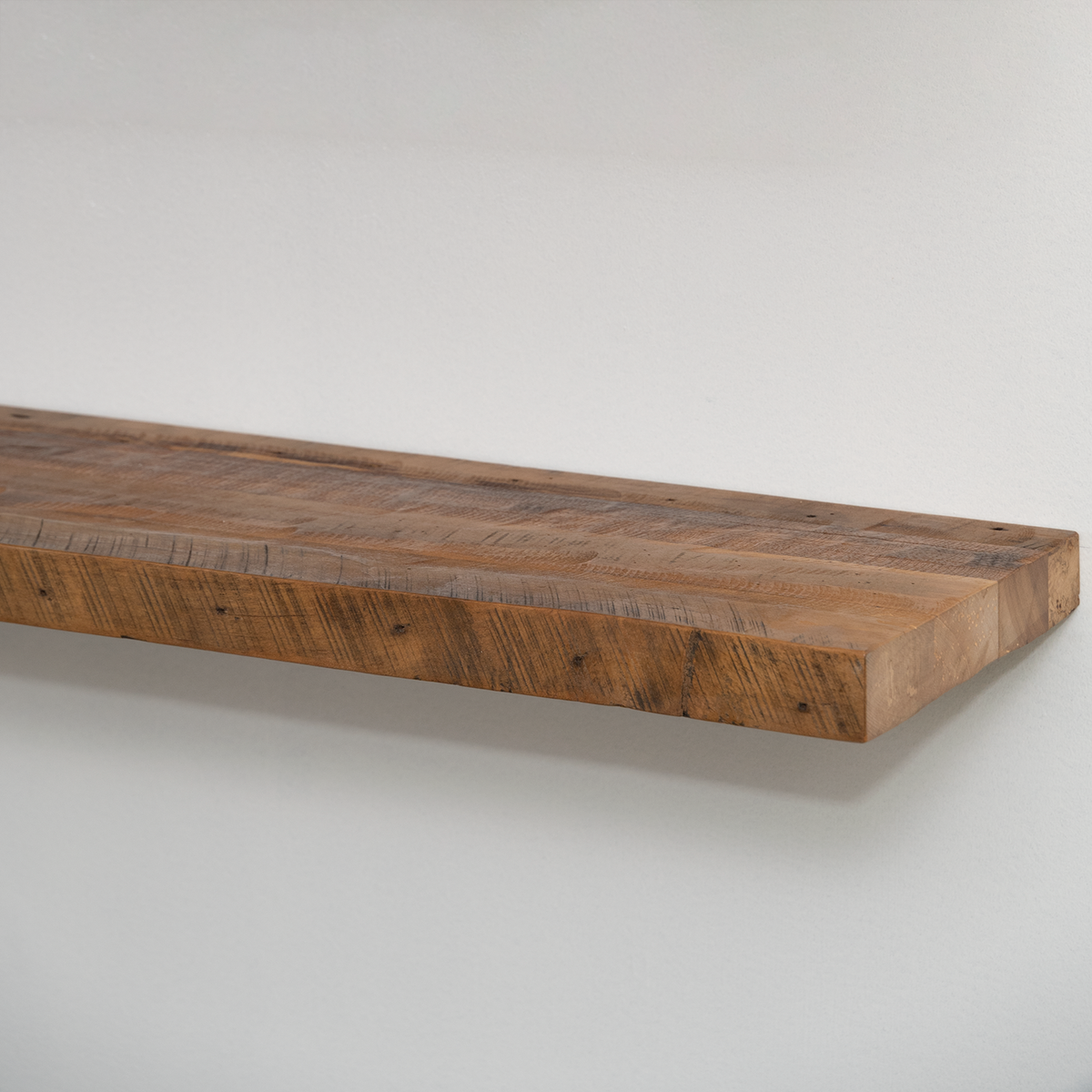 Reclaimed urbandi wooden shelf on a white background