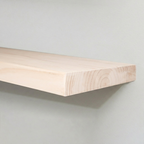 Wooden Floating Shelf on a White Wall