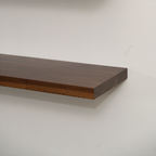 Walnut Wood Floating Shelf on a wall 