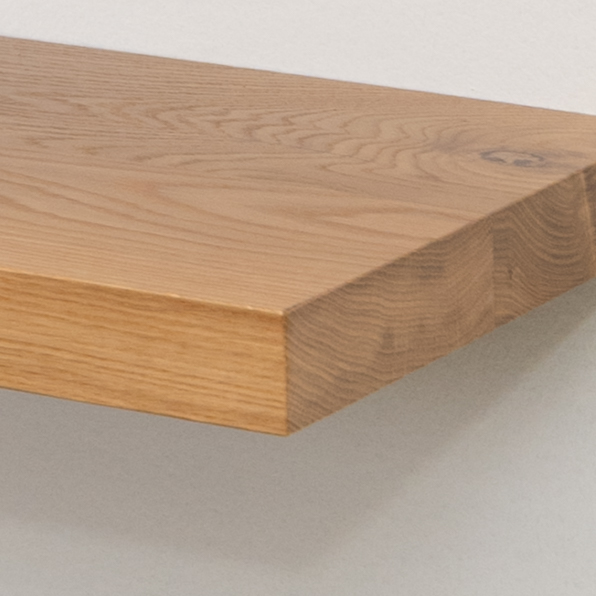 Wooden white oak floating shelf on a light color wall