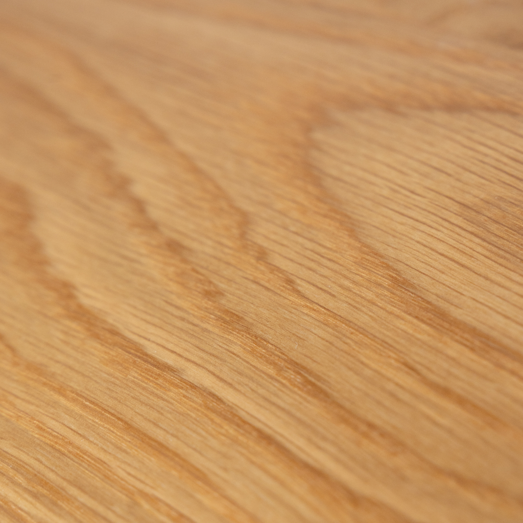 Close-up of a wooden white oak surface with visible grain and texture