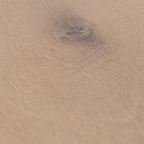 Close-up of a wooden white oak surface with a prominent grain pattern