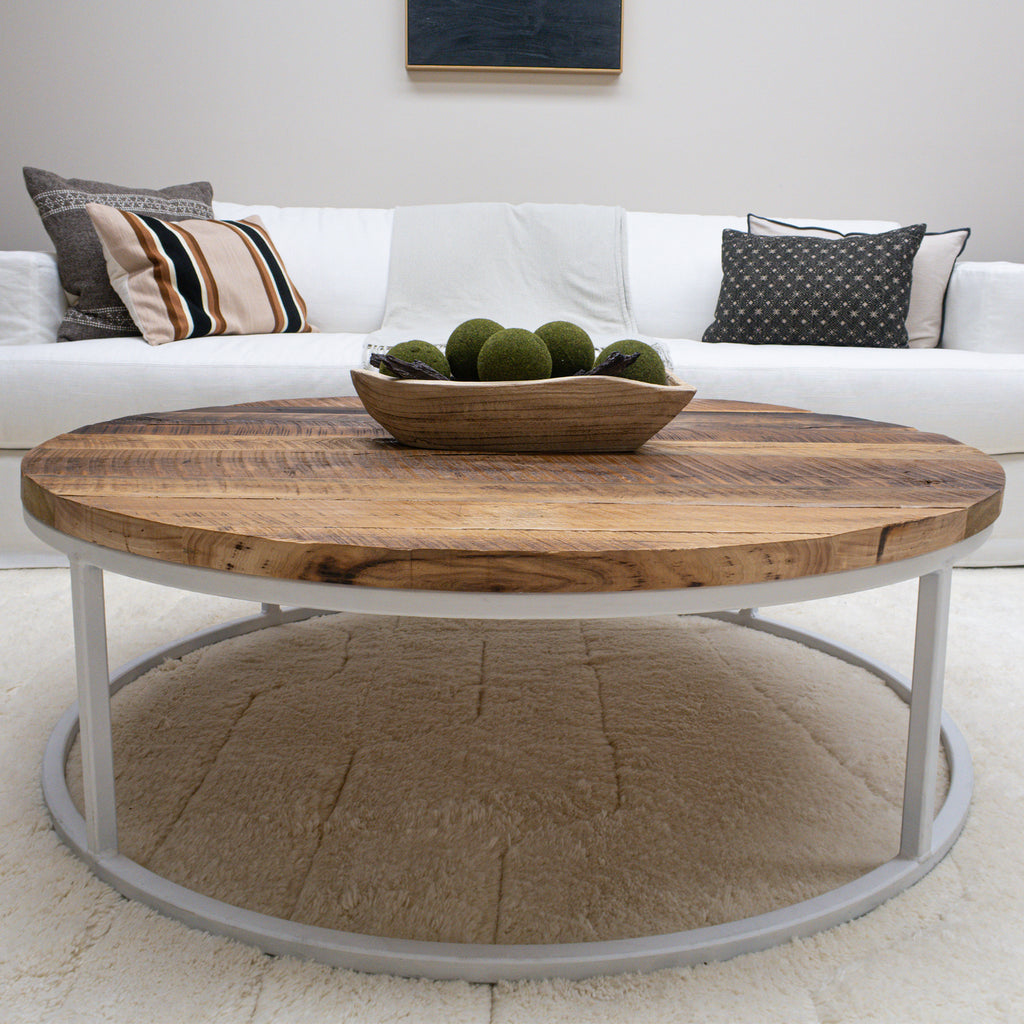 Modern Round Reclaimed Wood Coffee Table with White Metal Base in Living Room