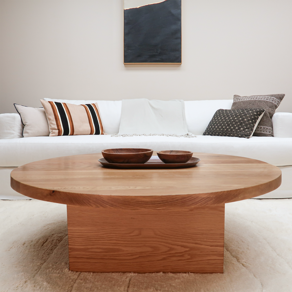 Round White Oak Wood Coffee Table With Square Base in Living Room