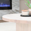 B&W Round Wood Coffee Table With Square Base in Living Room