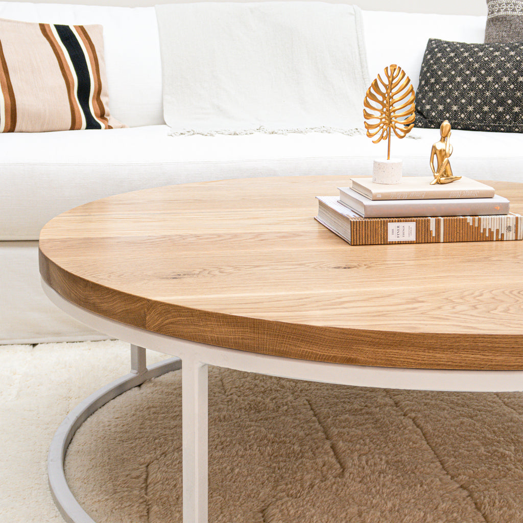 Round White Oak Wood Coffee Table with White Frame in Living Room