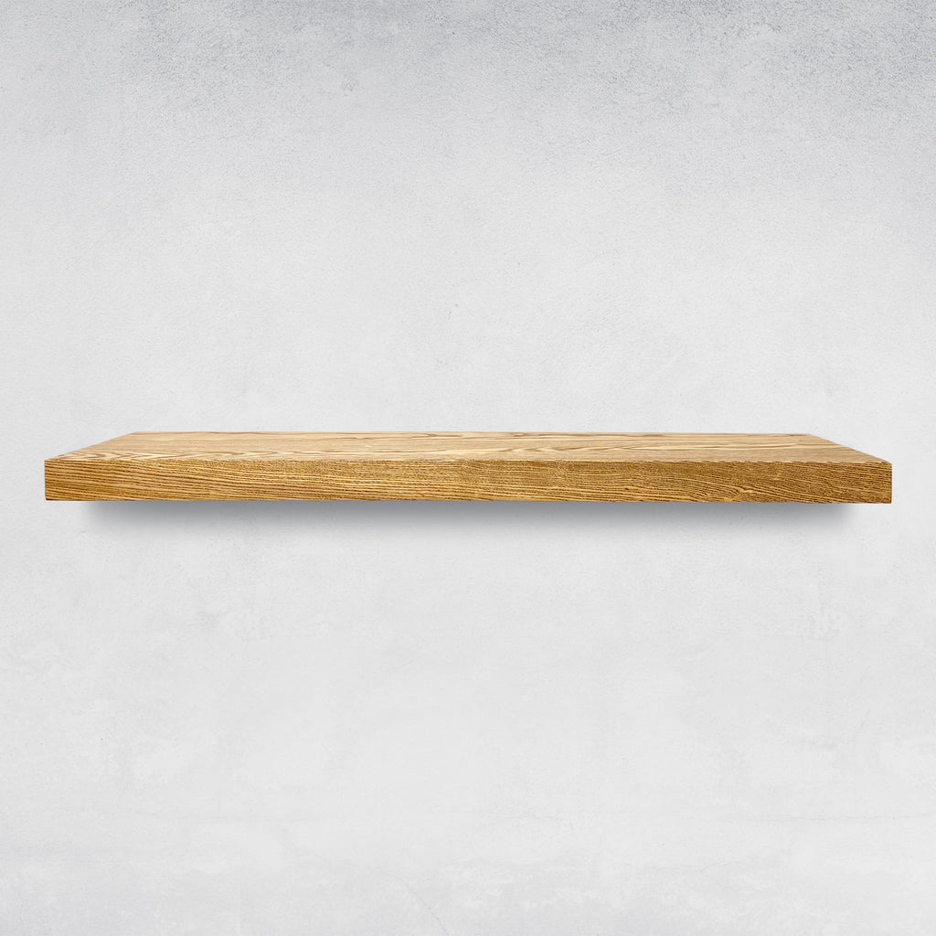 Aged Oak wooden floating shelf on a light background