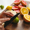 Cutting Fruits on Custom White Oak Wood Cutting Board in Kitchen