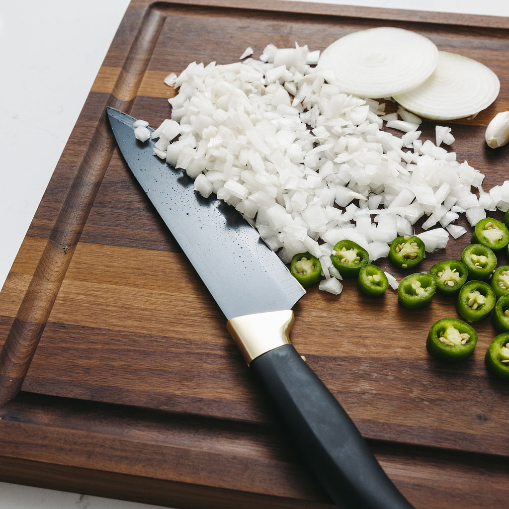 Cooking with Knife on Custom Walnut Wood Cutting Board