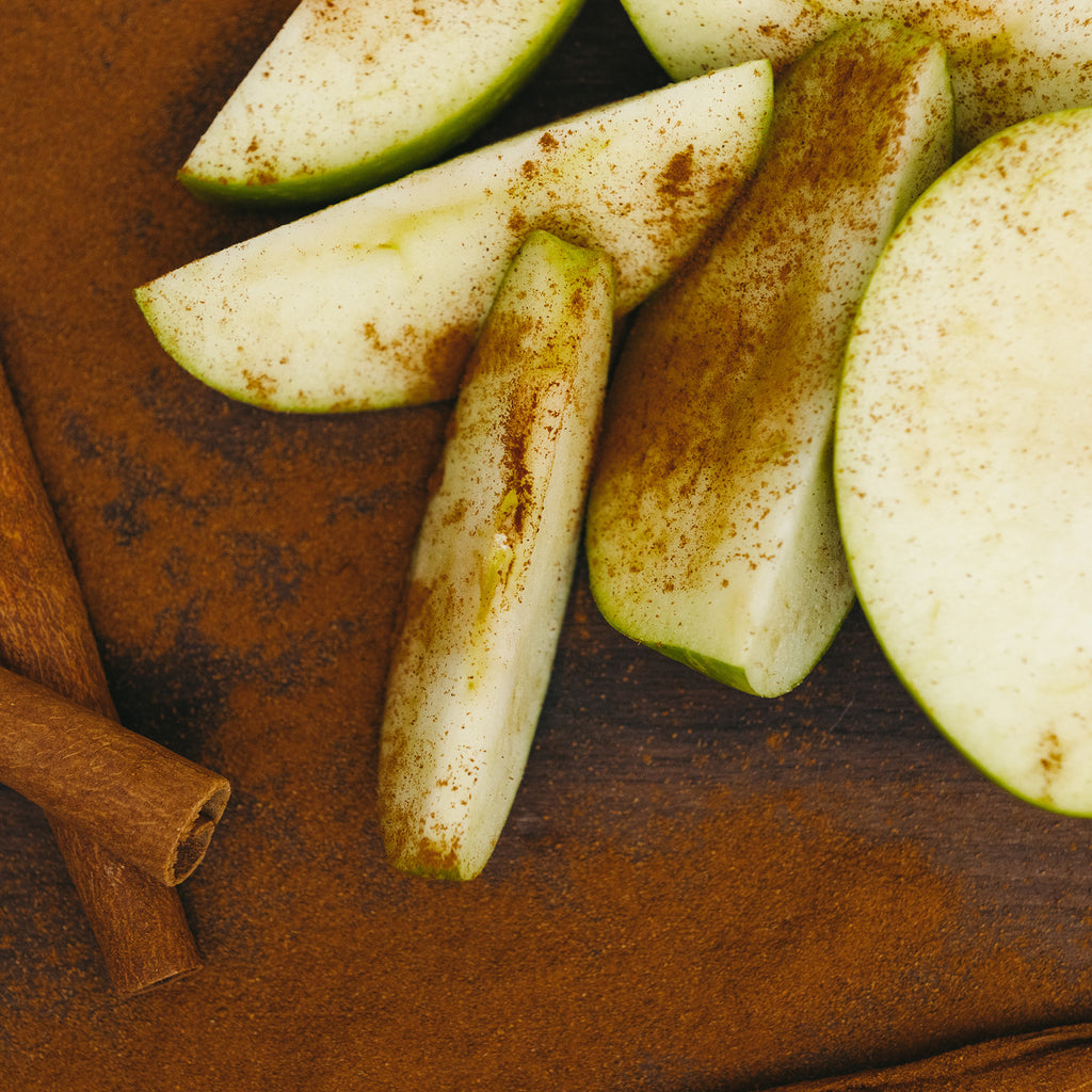 Apple with Cinnamon on Custom Walnut Wood Cutting Board