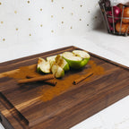 Apple with Cinnamon on Custom Walnut Wood Cutting Board in Kitchen
